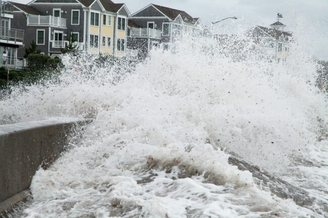 water rushing over a wall