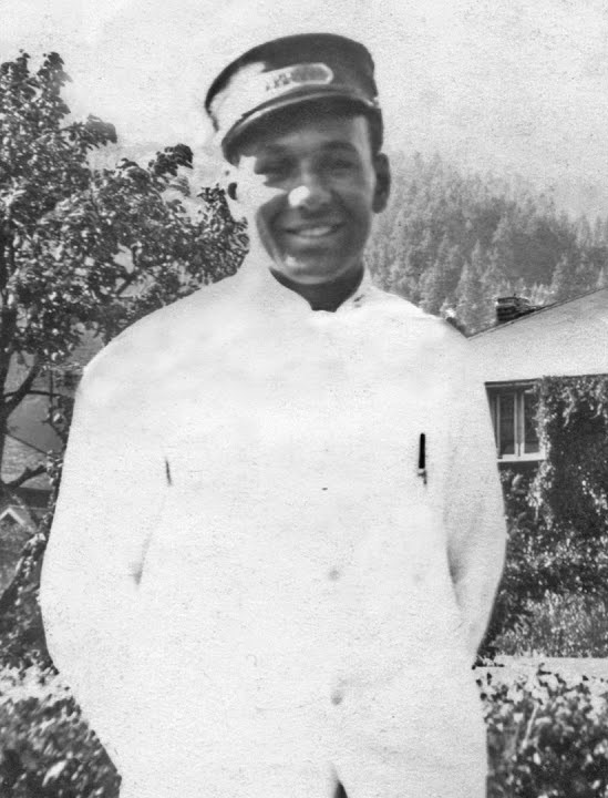 black and white photo of a sleeping car porter